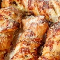 Regular Bread Twists  · 5 Twisted Pizza Dough Pieces with Garlic Sauce, Cheese, inside & Garlic Butter and Parmesan ...