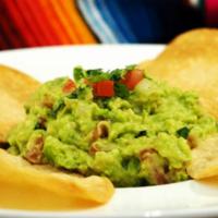 Guacamole & Chips · Freshly made guacamole. crafted from avocado. tomatoes, cilantro, onions. lime juice. salt, ...