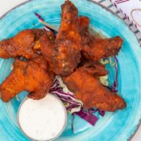 Chicken Wings · Seasoned drummies. Tossed in your choice of Buffalo, BBQ or dry. Served with your choice of ...