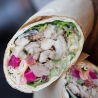 Chicken Shawarma Wrap · Mix Greens, Hummus, Persian Cucumbers, Tomatoes, Pickled Turnips, Tahini, Garlic Sauce