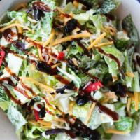 Bbq Salad · Romaine lettuce, corn, black beans, cilantro, tomatoes and scallions, topped with tortilla s...