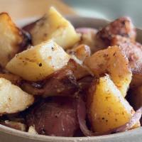 Sauteed Potatoes · Gluten free. Sauteed potatoes, red onions, garlic, herb seasoning.