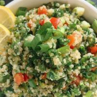 Tabouleh · Chopped parsley, bulgar (crushed wheat), tomatoes, onions, spices, olive oil and lemon juice...