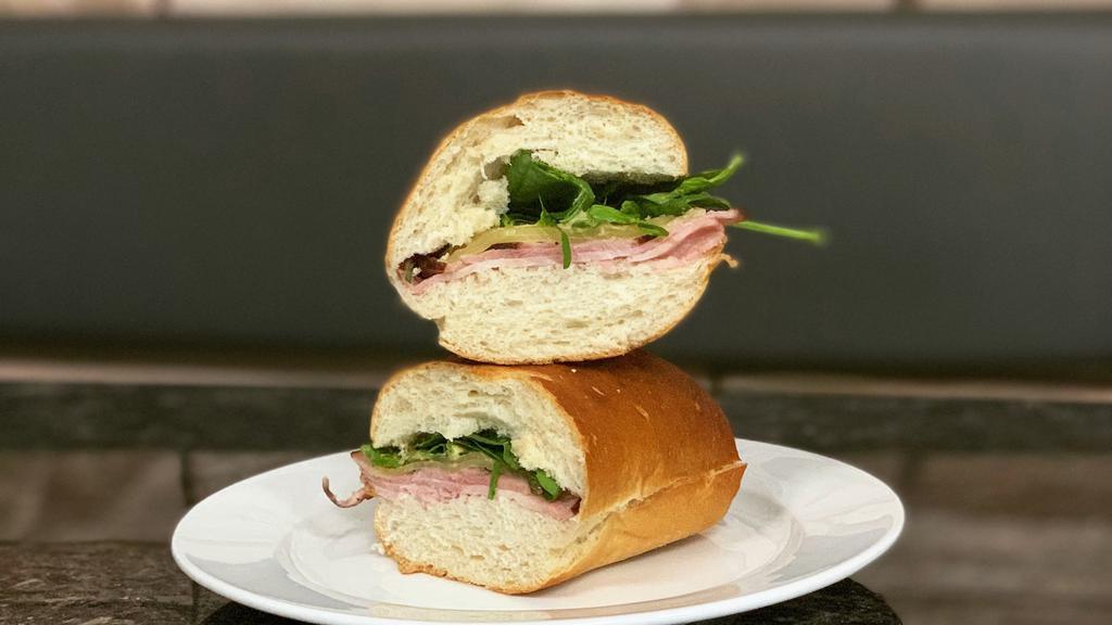The Frenchman · Black forest ham, swiss, mixed greens, and spicy dijon on bread.
