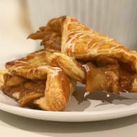 Apple Turnover · Puff pastry filled with cinnamon apple goodness, topped with house-made glaze