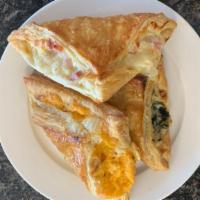 Khachapuri  (Spinach & Feta) · Flaky puff pastry turnover filled a blend of spinach and feta cheese.