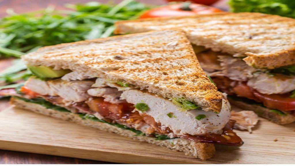 Grilled Chicken Breast Sandwich · Juicy chicken breast prepared with Italian seasoning, melted Parmesan cheese, fresh lettuce, tomatoes, mayo, mustard, salt and pepper served on choice of bread