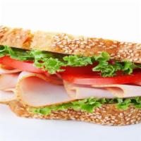 Classic Turkey Sandwich · 1/4 lb turkey, locally grown lettuce, tomatoes, mayo, mustard served on choice of bread