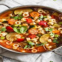 Minestrone Soup · Traditional Italian soup with locally grown vegetables served in a hearty broth
