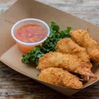 Coconut Shrimp · Coconut crusted shrimp served with house made orange chili dipping sauce