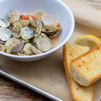 Drunken Clams  · Little neck clams in our zesty tomato basil white wine broth served with grilled garlic bread