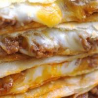 Short Rib Quesadilla  · braised beef short rib jack/cheddar cheese. served with salsa and secret sauce