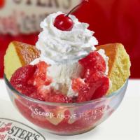 Strawberry Shortcake · Two scoops of vanilla ice cream on top of yellow cake topped with sliced strawberries in jui...