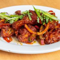Naughty Wings (6) · Chicken Wings Tossed In Special Curry Leaves Sauce
