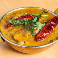 Goat Curry · Goat cooked in special gravy masala.