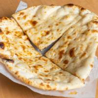 Butter Naan · Bread cooked in oven and buttered.
