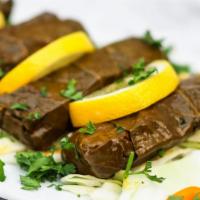Warak Enab (Dolma/Sarma) · Vegan and Gluten-free. Grape leaves stuffed with rice, onion, tomato, parsley cooked in oliv...