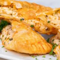 Cheese Fatayer (Boreg) · Vegetarian. Deep fried turnovers stuffed w/white cheese, parsley, and Aleppo pepper spice (s...