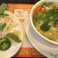 Pho Seafood · Rice noodle soup with shrimp, fish ball, squid, imitation crab.