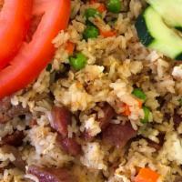 1  Chinese Sauage · Fried rice are served with eggs, green peas, carrots, corn, and Chinese Sausage