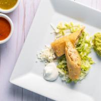 3 Chicken Taquitos · Taquitos served with lettuce, fresh guacamole, cheese and cream