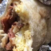 Breakfast Burrito Chicken  · 3 scrambled eggs, cheese, black beans and choice of angus carne asada, chicken, bacon, chori...