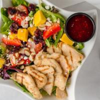 Citrinas  Salad · Grilled chicken, Spring mix, strawberries, mango, goat cheese, dried cranberries, almonds, r...