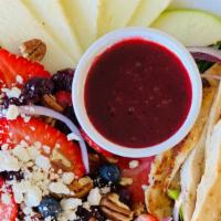 Berry Goddess Salad · Grill chicken breast ,kale, green apple strawberries, red onion, dried cranberries, pecans, ...