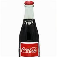 Medio Litro Mexican Coke · 500ml. - glass bottle.