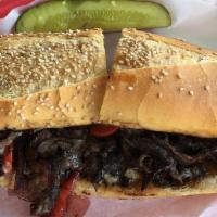 Philly Cheese Steak · Grilled roast beef, bell peppers, onion and provolone on house-made hoagie roll.