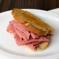 New York Corned Beef · Lean corned beef and spicy deli mustard on house-made rye.