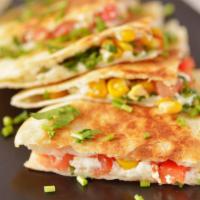 Queso Picante Quesadilla · Melted pepper jack cheese, cheddar cheese, chopped jalapeños, red roasted peppers, and caram...