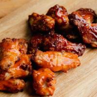 Wings · Buffalo, BBQ or garlic Parmesan wings with ranch or blue cheese on the side.