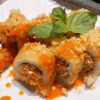 Tiger Tempura Roll · Two tempura shrimps. Spicy tuna. Crabmeat and crunch mixed in spicy mayo sauce. Deep fried. ...