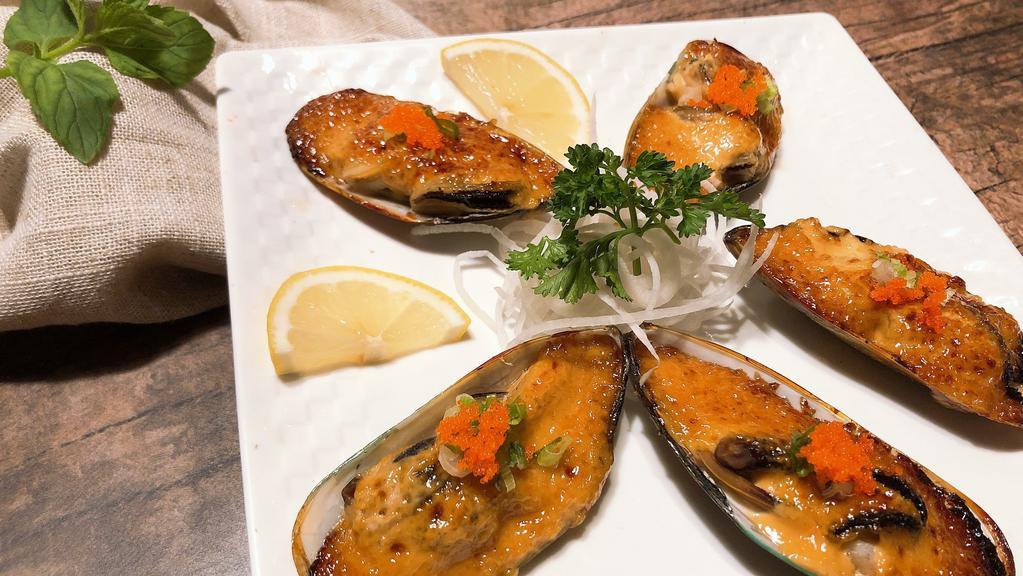 Baked Green Mussel · Mussels broiled with sesame mayo sauce.