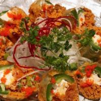 Heart Attack · Spicy. Deep fried spicy tuna, cream cheese, jalapeno, with masago and eel sauce.