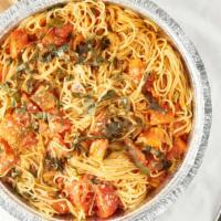 Tomato Basil Over Spaghettini · Served with fresh garlic, shallots, roma tomatoes and basil.