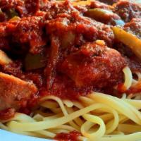 Italian Sausage Cacciatore · Simmered sliced sausages mushroom green pepper red sauce & wine.