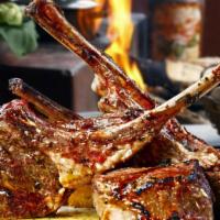 Lamb Chop Combo Plate · Premium French Cut Lamb Chops Grilled To Perfection,
Served Over a Bed of Basmati White Rice...