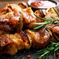 Pork Shish Kabob · Pork Shish Kabobs Marinated In Salt, Pepper, Paprika, & Fresh Onions, Then Smoke Grilled Ove...
