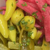 Mixed Red, Yellow And Green Pickles · Tasty Pickles mix of Red beets, Turnips, Cucumber, Yellow pepper in apple cyder and white vi...