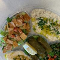 Ali Baba Sampler · Fattoush, tabbouleh, baba ghanooj, hummus, grape leaves (4 pieces) and 2 pita breads