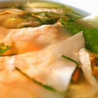 Chicken Dumpling Soup · Chicken dumplings, Chinese greens, scallions.