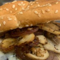 Garlic Mushroom Burger · Grilled onions, mushrooms,  garlic and melted pepper jack cheese on top of a juicy burger.