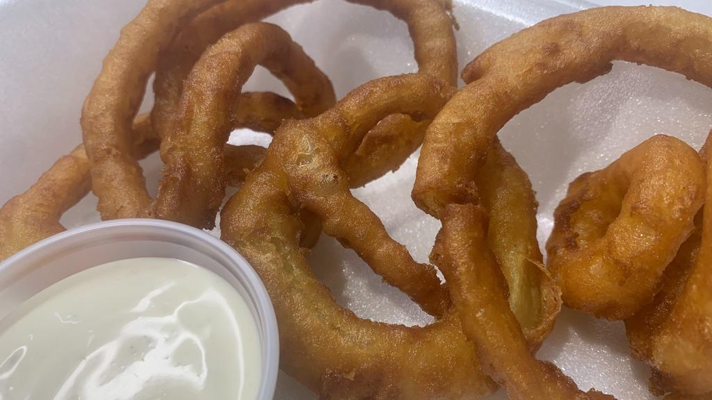 Onion Rings · Crispy onion rings come with ranch or ketchup.