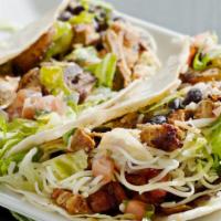Chicken Street Taco · Juicy grilled chicken with onions, cilantro and salsa.