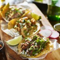 Pork Al Pastor Street Taco · Traditionally cooked pork served in a delicious soft taco.