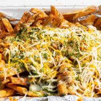 Chili Cheese Shrimp Fries · Chili cheese fries, homemade chili and shrimp.