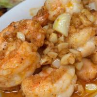 Camarones Al Mojo De Ajo · Shrimp with special garlic sauce.