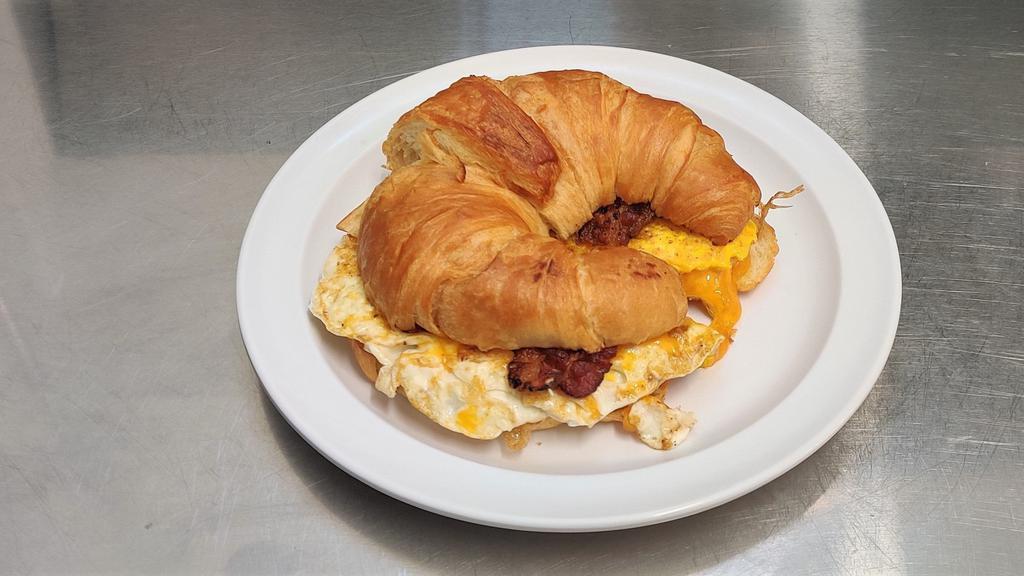 Croissant · Toasted Croissant with choice of meat, egg, and cheese.